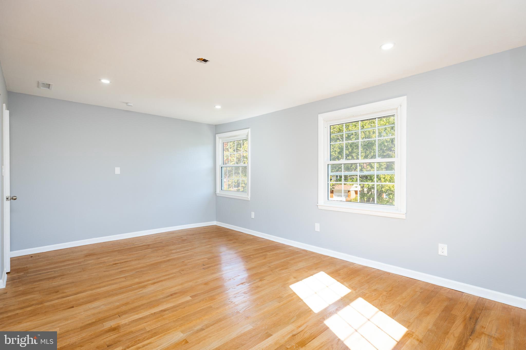 2404 2404-rambler Rambler Road Wilmington, DE 19810 - Photo 23 of 28 a view of an empty room with wooden floor and a window