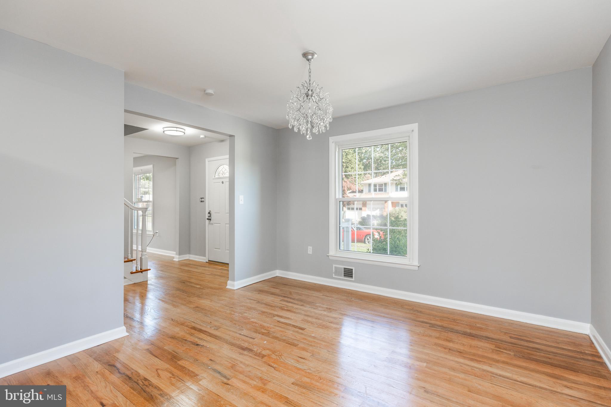 2404 2404-rambler Rambler Road Wilmington, DE 19810 - Photo 6 of 28 a view of an empty room with wooden floor and a window