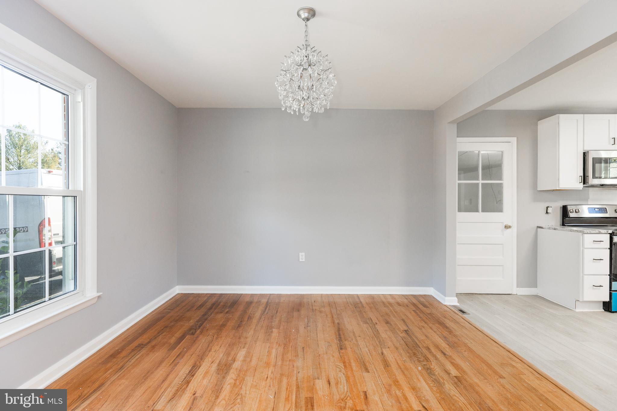 2404 2404-rambler Rambler Road Wilmington, DE 19810 - Photo 7 of 28 a view of empty room with wooden floor and window