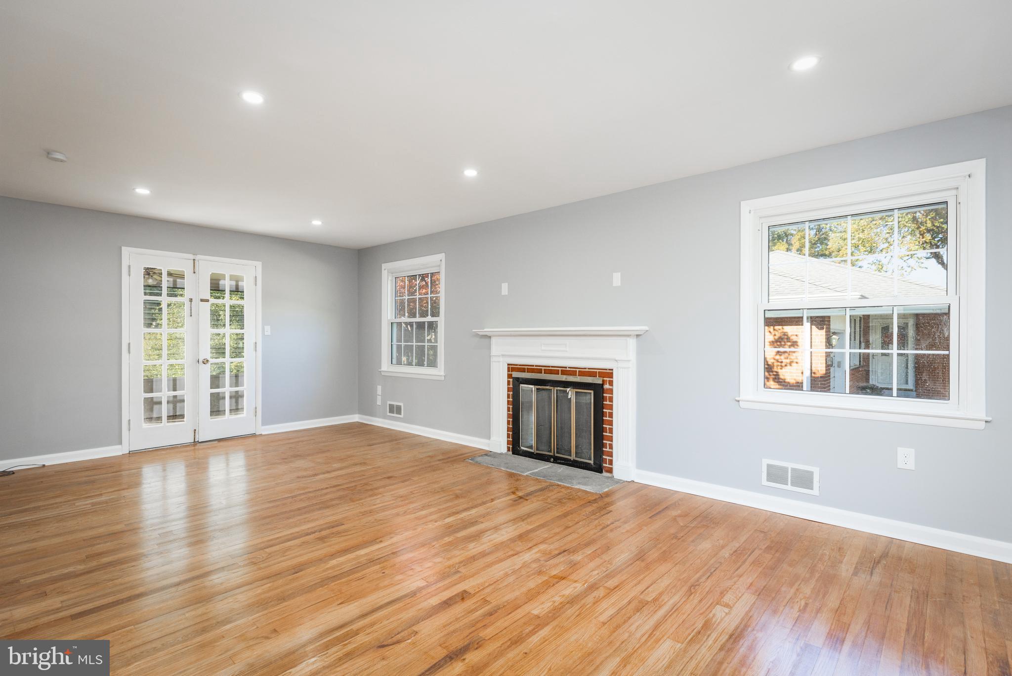 2404 2404-rambler Rambler Road Wilmington, DE 19810 - Photo 10 of 28 a view of an empty room with wooden floor and a window
