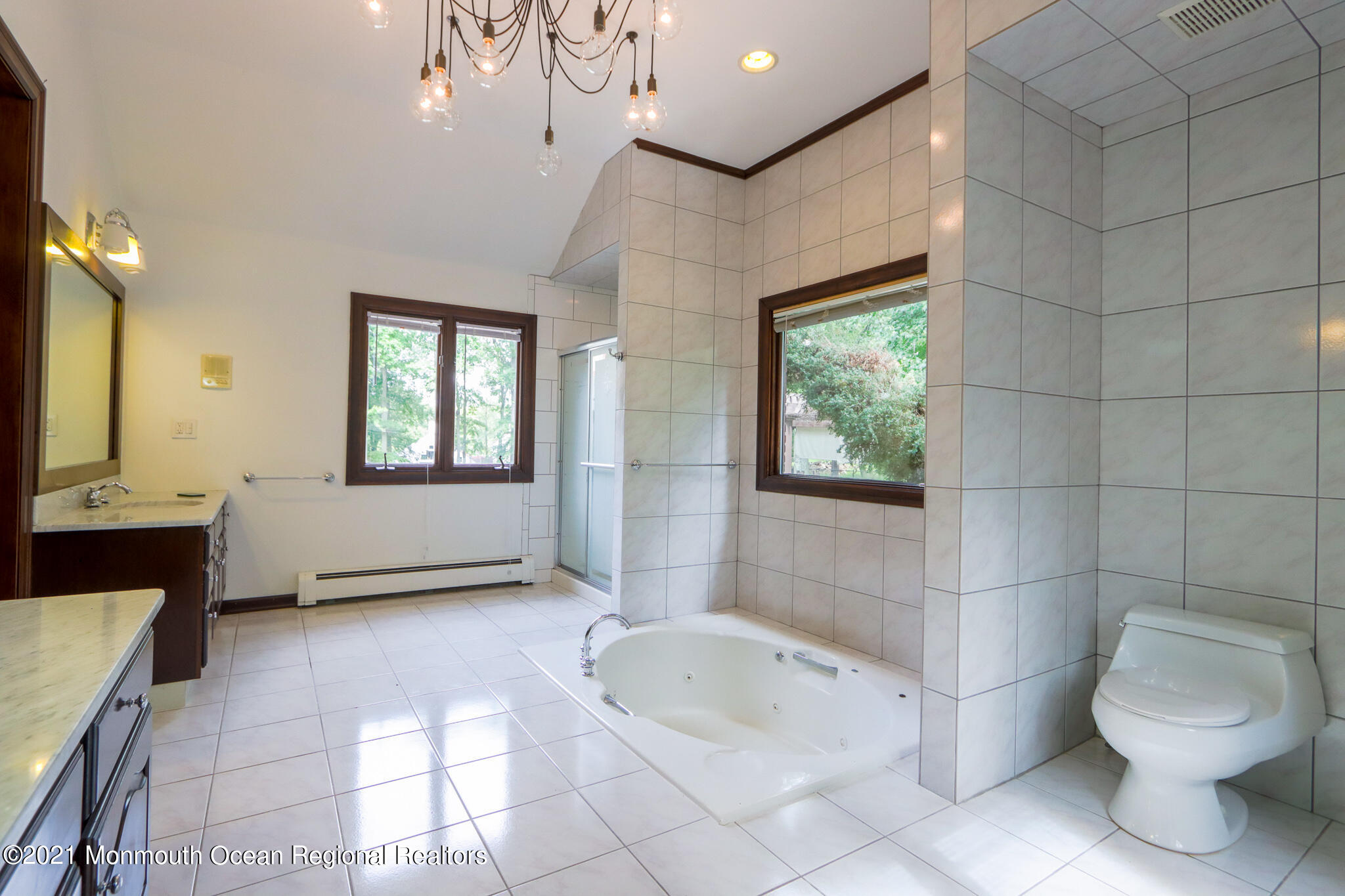 7 Perrine Circle Millstone Township, NJ 08535 - Photo 12 of 27 a bathroom with a bathtub sink and toilet