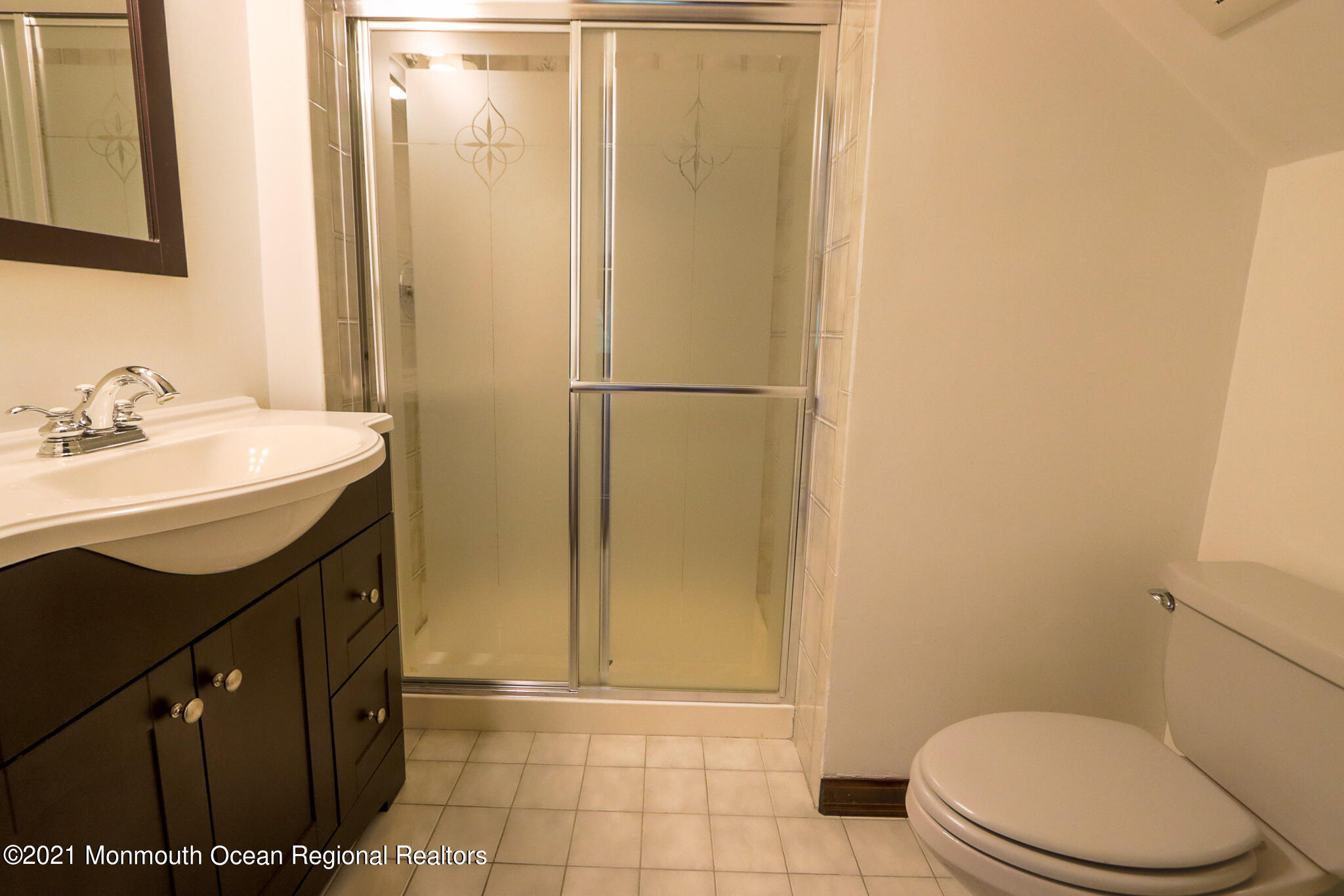7 Perrine Circle Millstone Township, NJ 08535 - Photo 23 of 27 a bathroom with a sink a toilet and shower