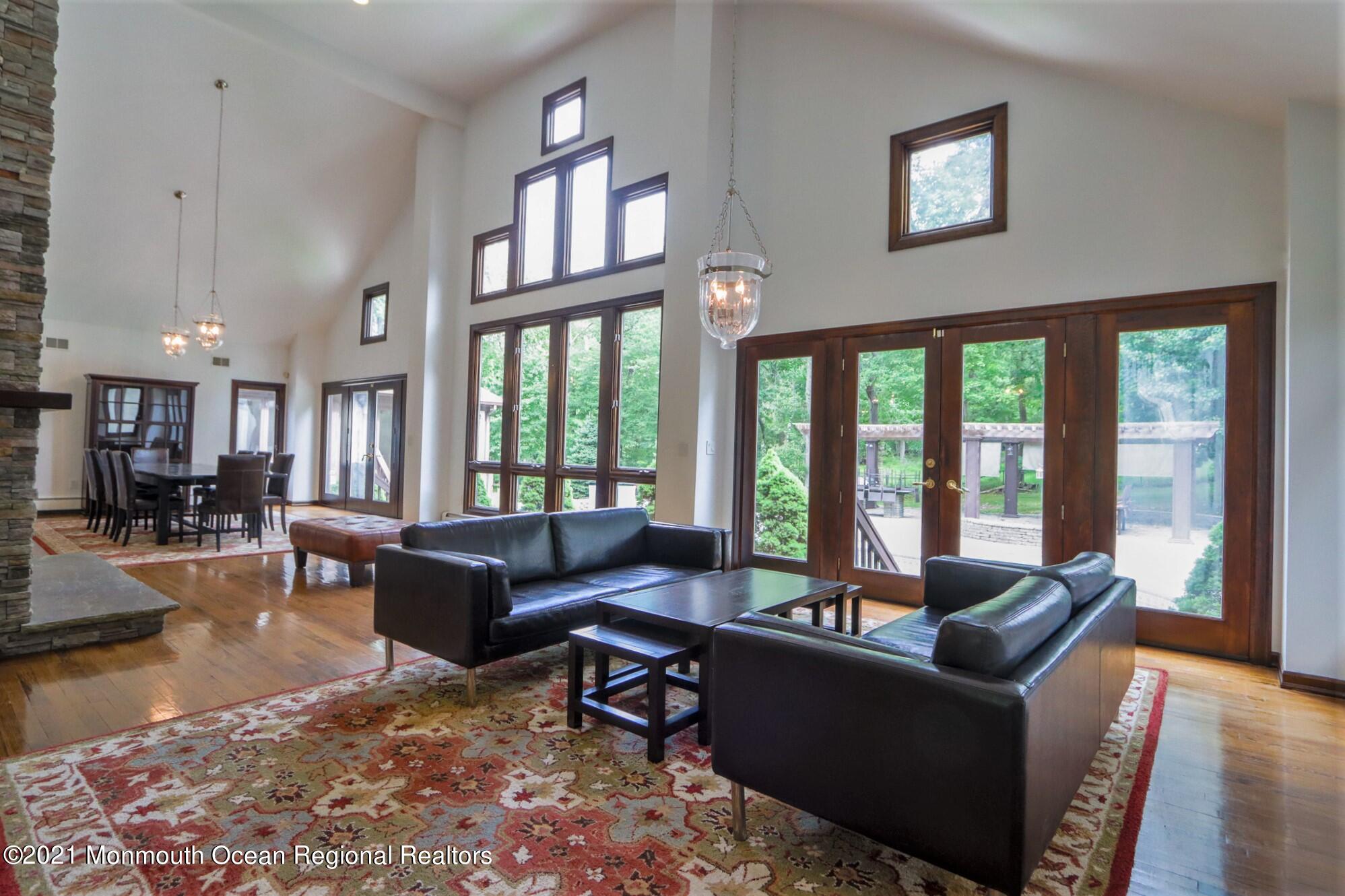 7 Perrine Circle Millstone Township, NJ 08535 - Photo 6 of 27 a living room with furniture and a large window