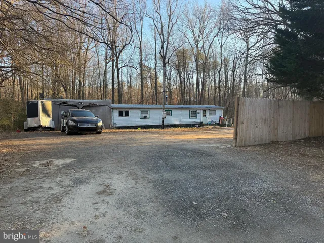 a car parked in front of a house