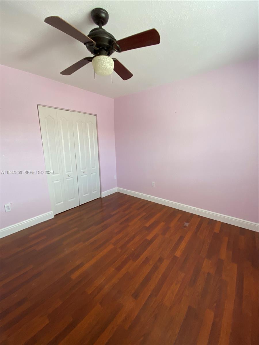 3503 West 76th Street, Unit 4 Hialeah, FL 33018 - Photo 19 of 31 a view of empty room with wooden floor