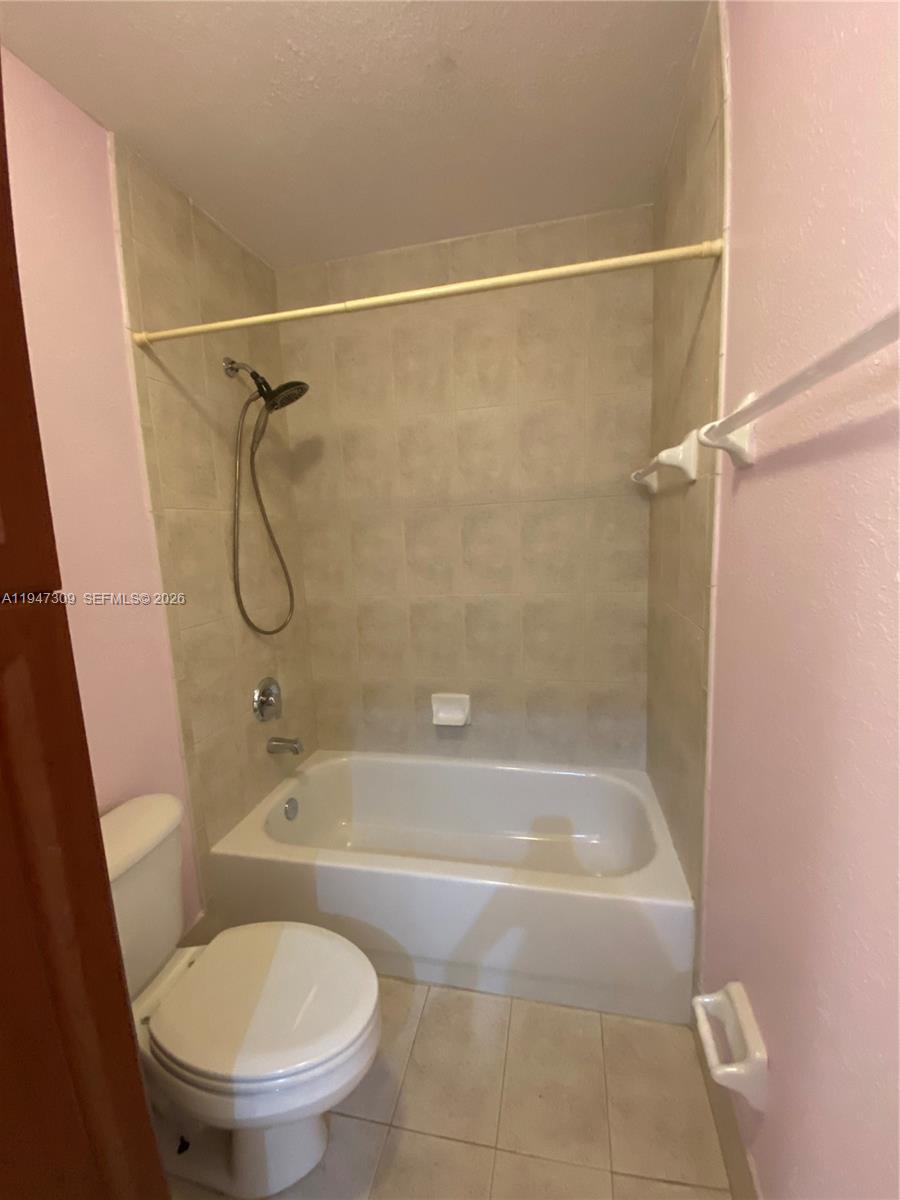 3503 West 76th Street, Unit 4 Hialeah, FL 33018 - Photo 22 of 31 a bathroom with a toilet and a shower