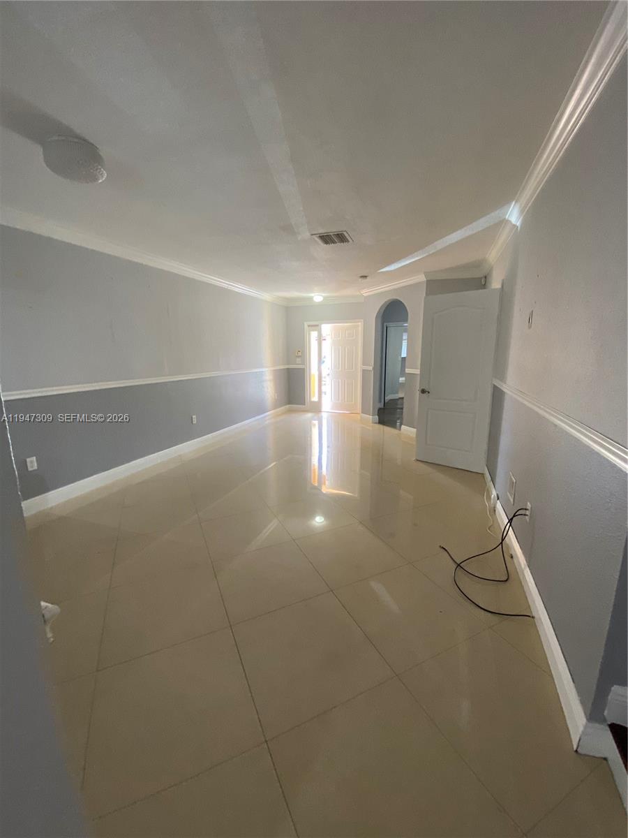 3503 West 76th Street, Unit 4 Hialeah, FL 33018 - Photo 5 of 31 a view of a garage