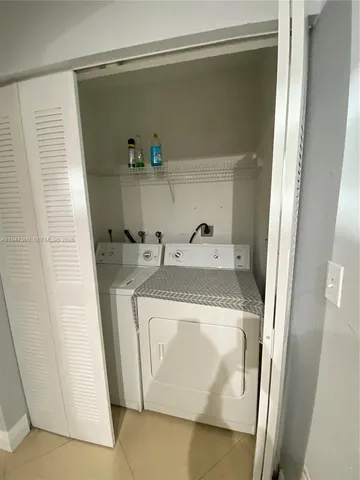 wooden floor in a hall with an entryway