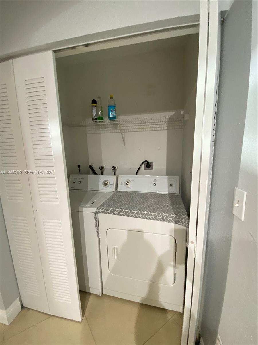 3503 West 76th Street, Unit 4 Hialeah, FL 33018 - Photo 10 of 31 a utility room with dryer and washer