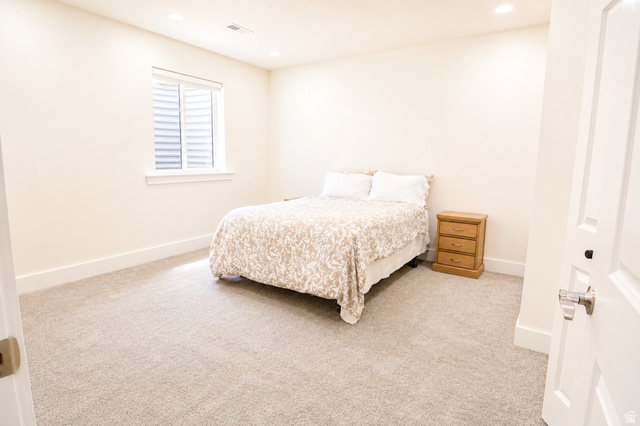 1055 North 1000 East Mapleton, UT 84664 - Photo 58 of 112 Neutral-toned carpeting paired with white baseboards and walls