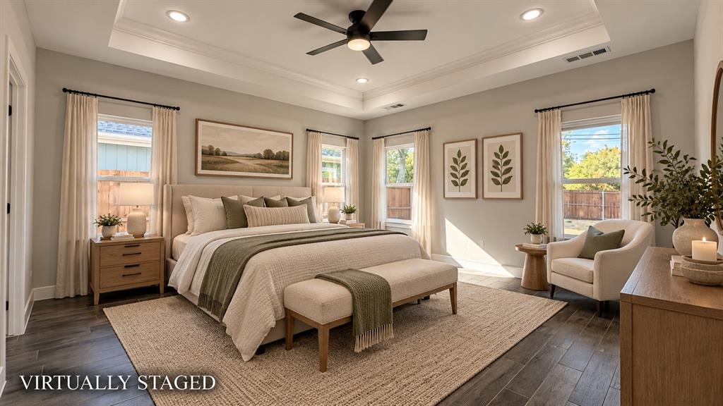 302-304 West Pine Street Whitewright, TX 75491 - Photo 25 of 38 Tray ceiling with recessed lighting and a ceiling fan, wood-finish flooring, and multiple windows