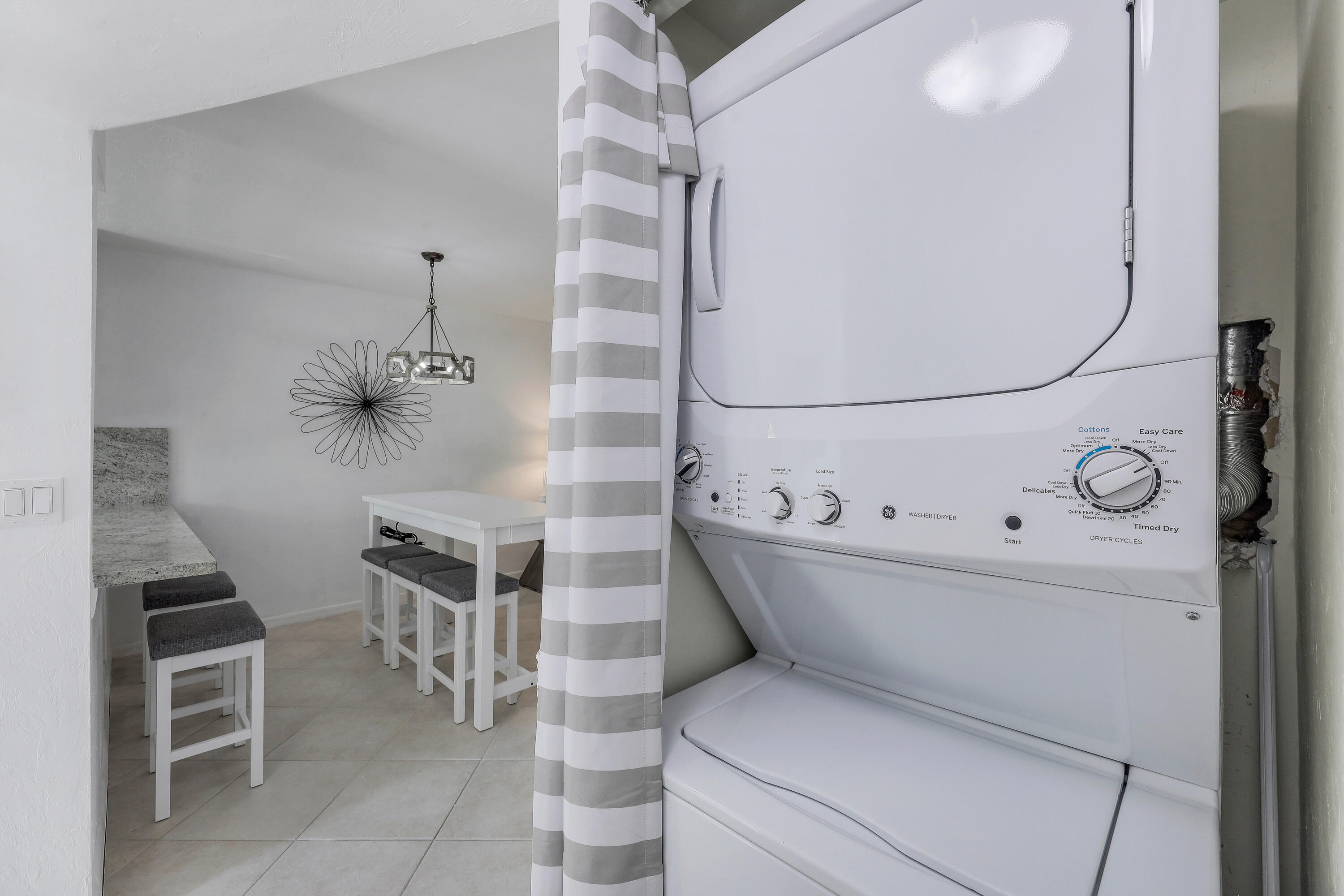 960 Huron Street, Unit 106 Marco Island, FL 34145 - Photo 19 of 39 a utility room with dryer and washer