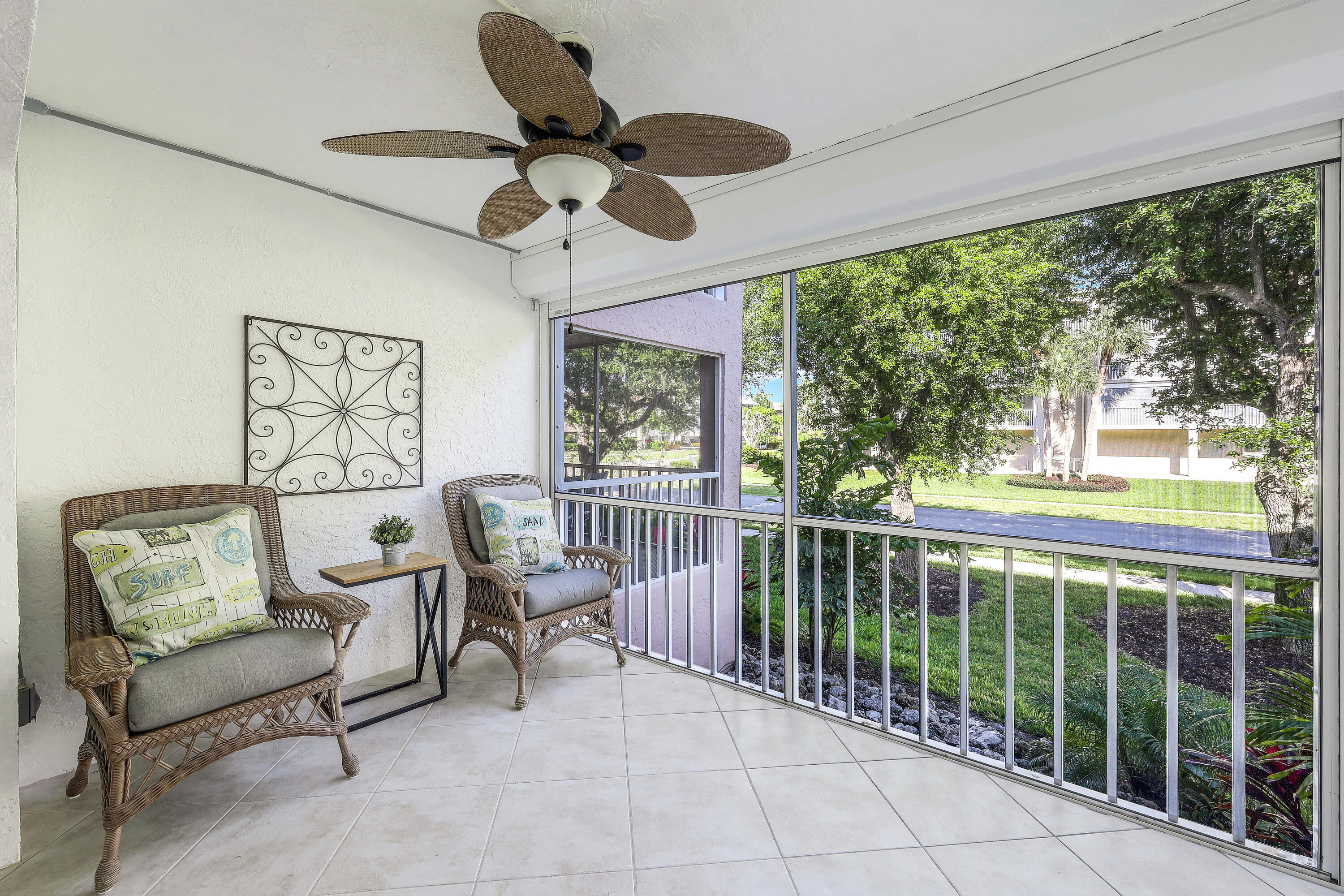 960 Huron Street, Unit 106 Marco Island, FL 34145 - Photo 20 of 39 a living room with furniture and a large window