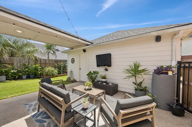a outdoor living space with furniture and garden view