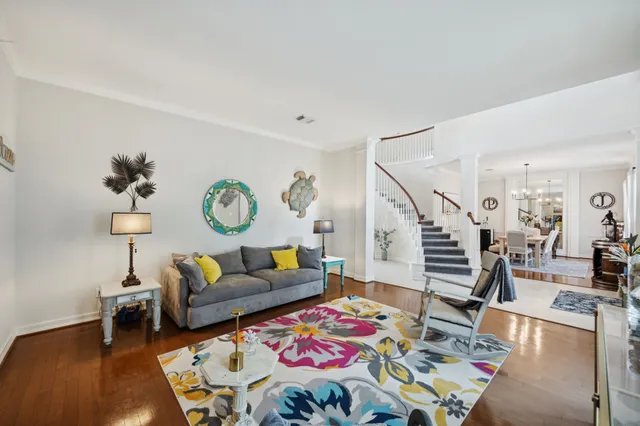 a living room with furniture and a table
