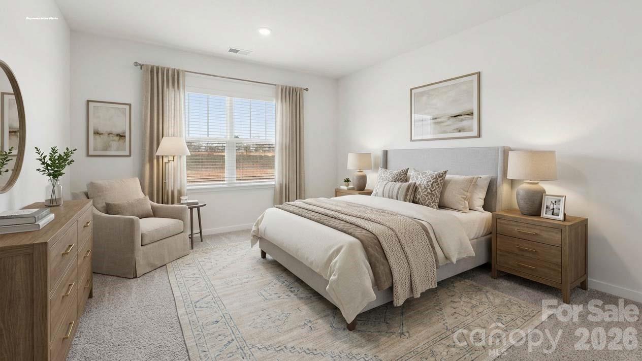 3913 Caroline Court Northwest Conover, NC 28613 - Photo 11 of 27 a bedroom with a bed and a couch
