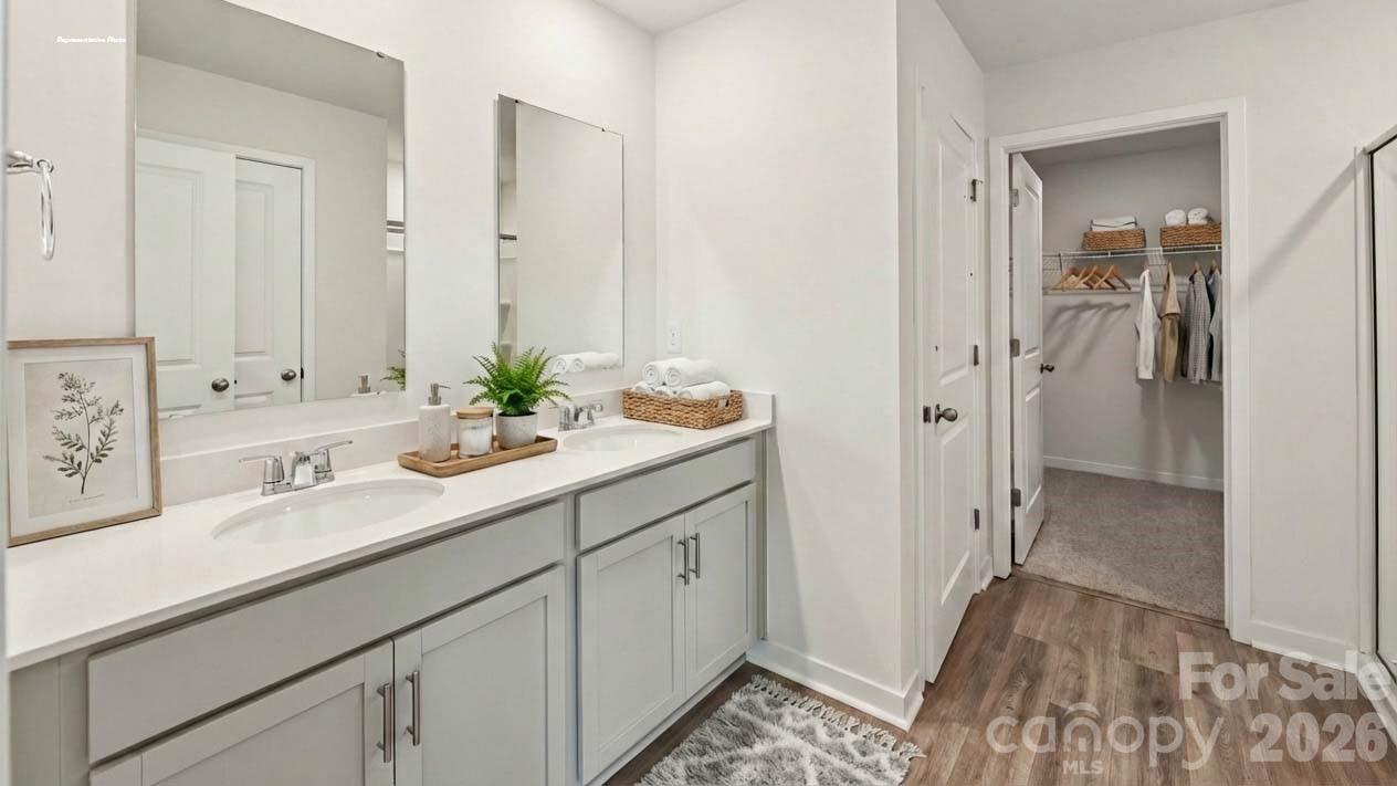 3913 Caroline Court Northwest Conover, NC 28613 - Photo 17 of 27 a bathroom with a sink and a mirror