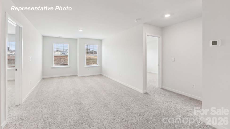 3913 Caroline Court Northwest Conover, NC 28613 - Photo 20 of 27 a view of an empty room with a window