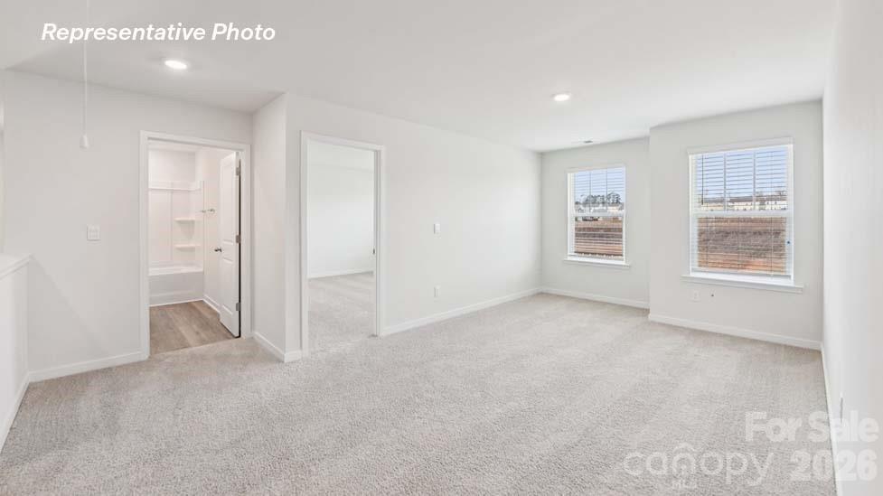 3913 Caroline Court Northwest Conover, NC 28613 - Photo 21 of 27 an empty room with windows and closet