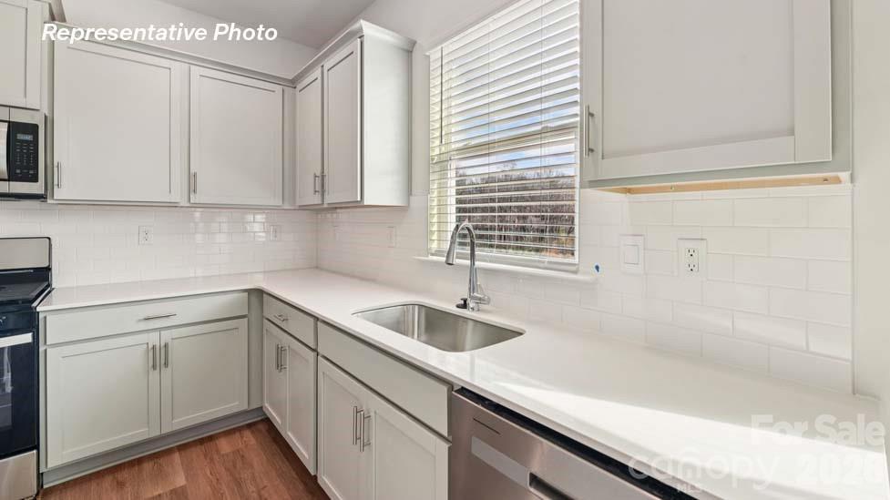3913 Caroline Court Northwest Conover, NC 28613 - Photo 10 of 27 a kitchen with a sink and cabinets