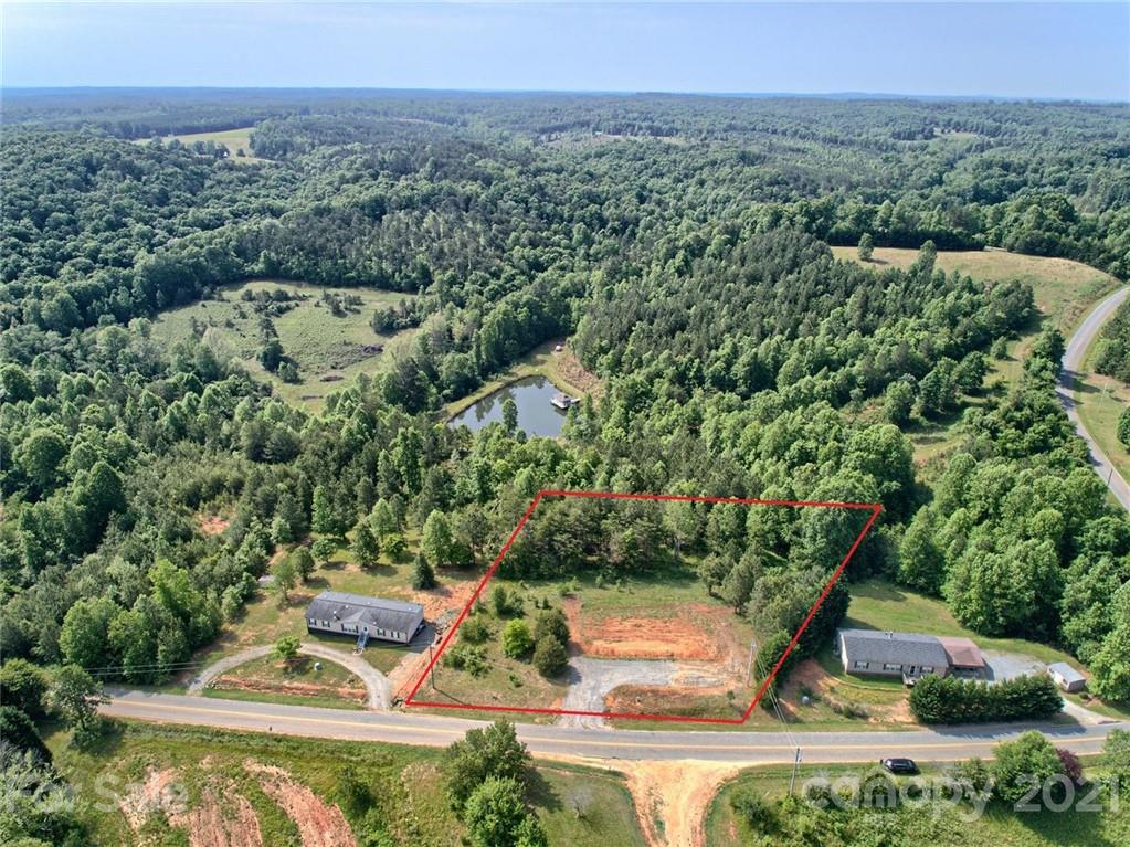 700 Will Green Road Tryon, NC 28782 - Photo 1 of 13 an aerial view of a house with a yard