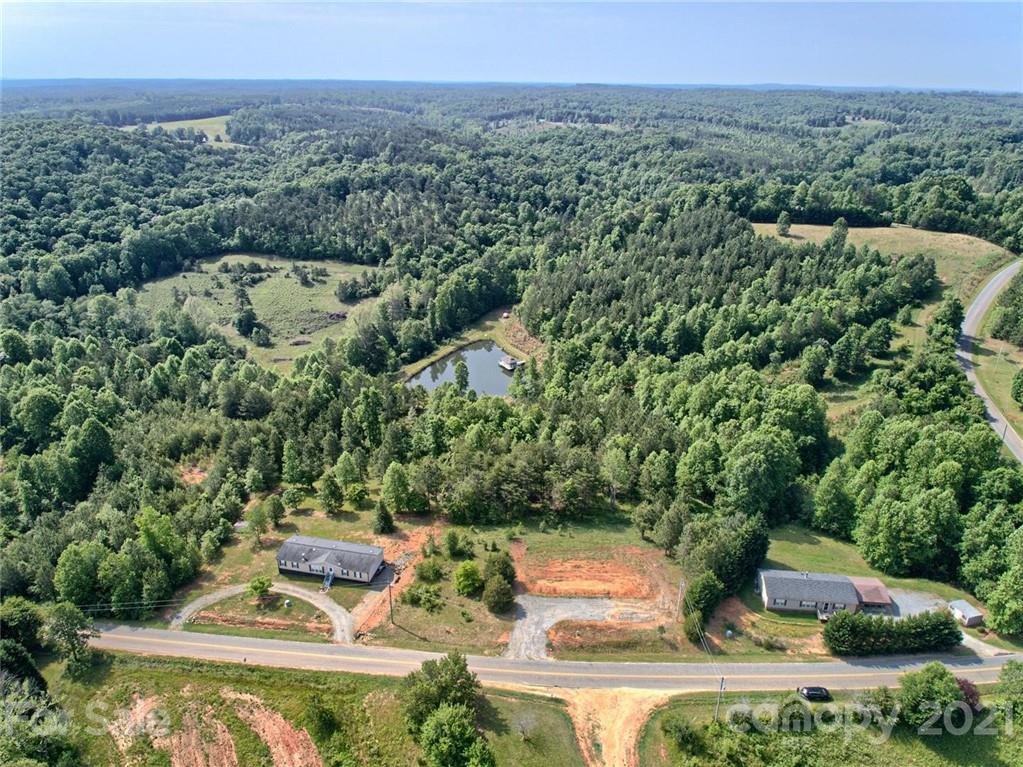 700 Will Green Road Tryon, NC 28782 - Photo 3 of 13 an aerial view of a house with a yard