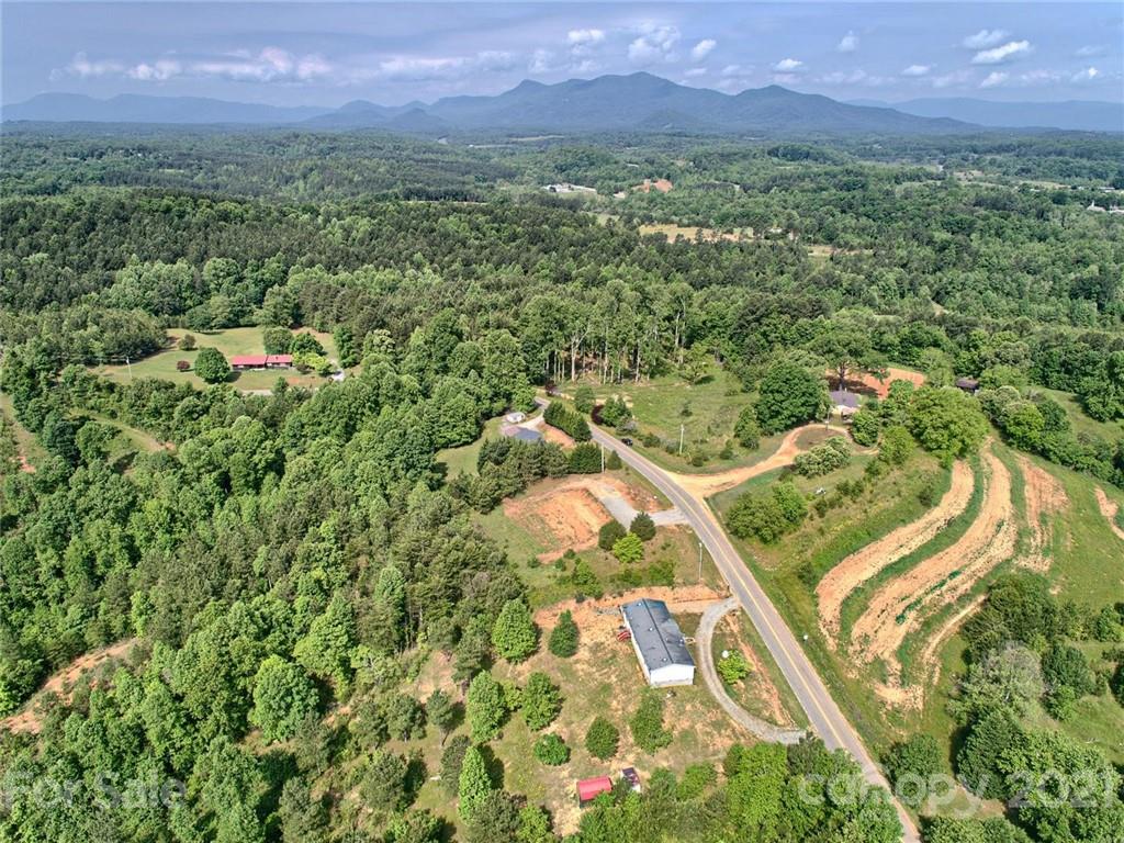 700 Will Green Road Tryon, NC 28782 - Photo 7 of 13 an aerial view of residential houses with outdoor space and trees