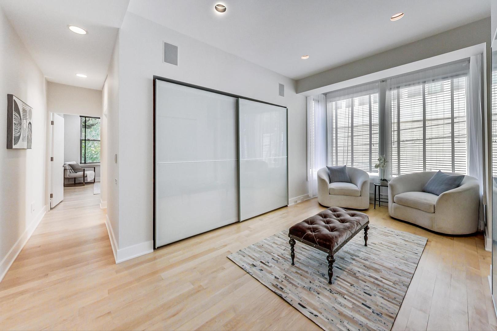17 East Scott Street Chicago, IL 60610 - Photo 24 of 39 a living room with furniture and a window