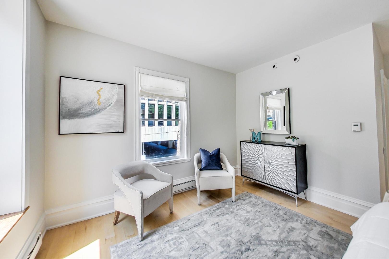 17 East Scott Street Chicago, IL 60610 - Photo 31 of 39 a living room with furniture and wooden floor