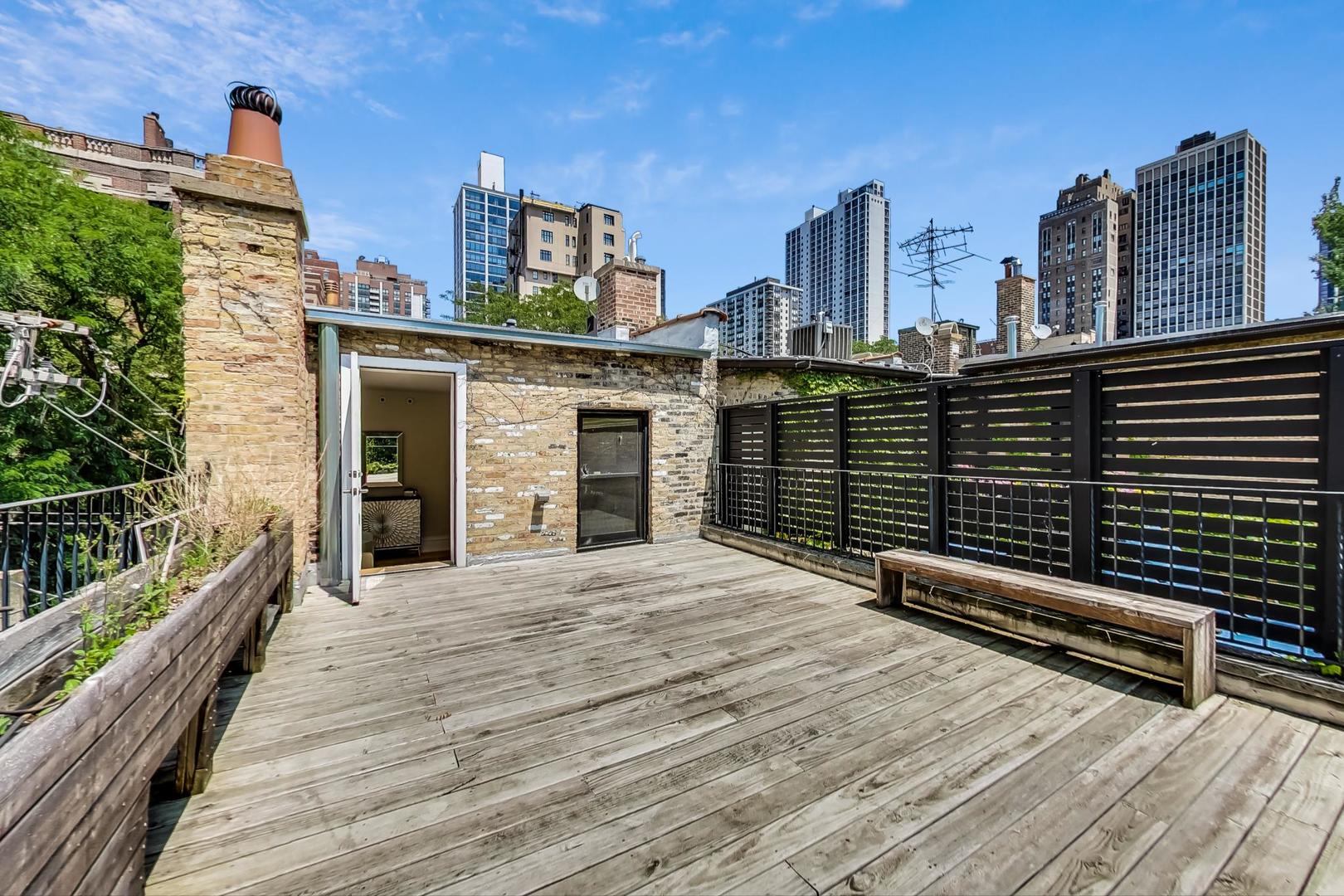 17 East Scott Street Chicago, IL 60610 - Photo 33 of 39 a view of a balcony with city view