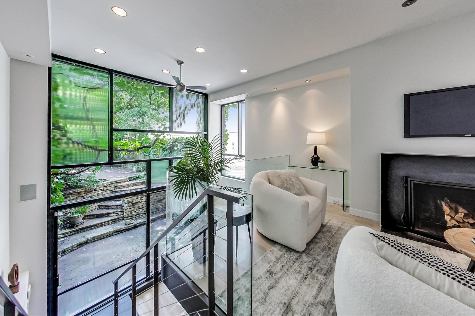 17 East Scott Street Chicago, IL 60610 - Photo 5 of 39 a living room with furniture and a fireplace