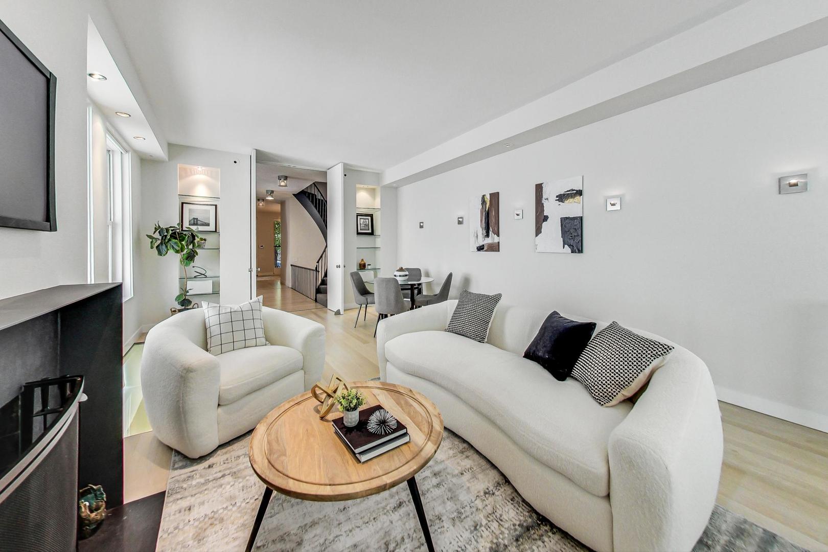 17 East Scott Street Chicago, IL 60610 - Photo 7 of 39 a living room with furniture fireplace and window