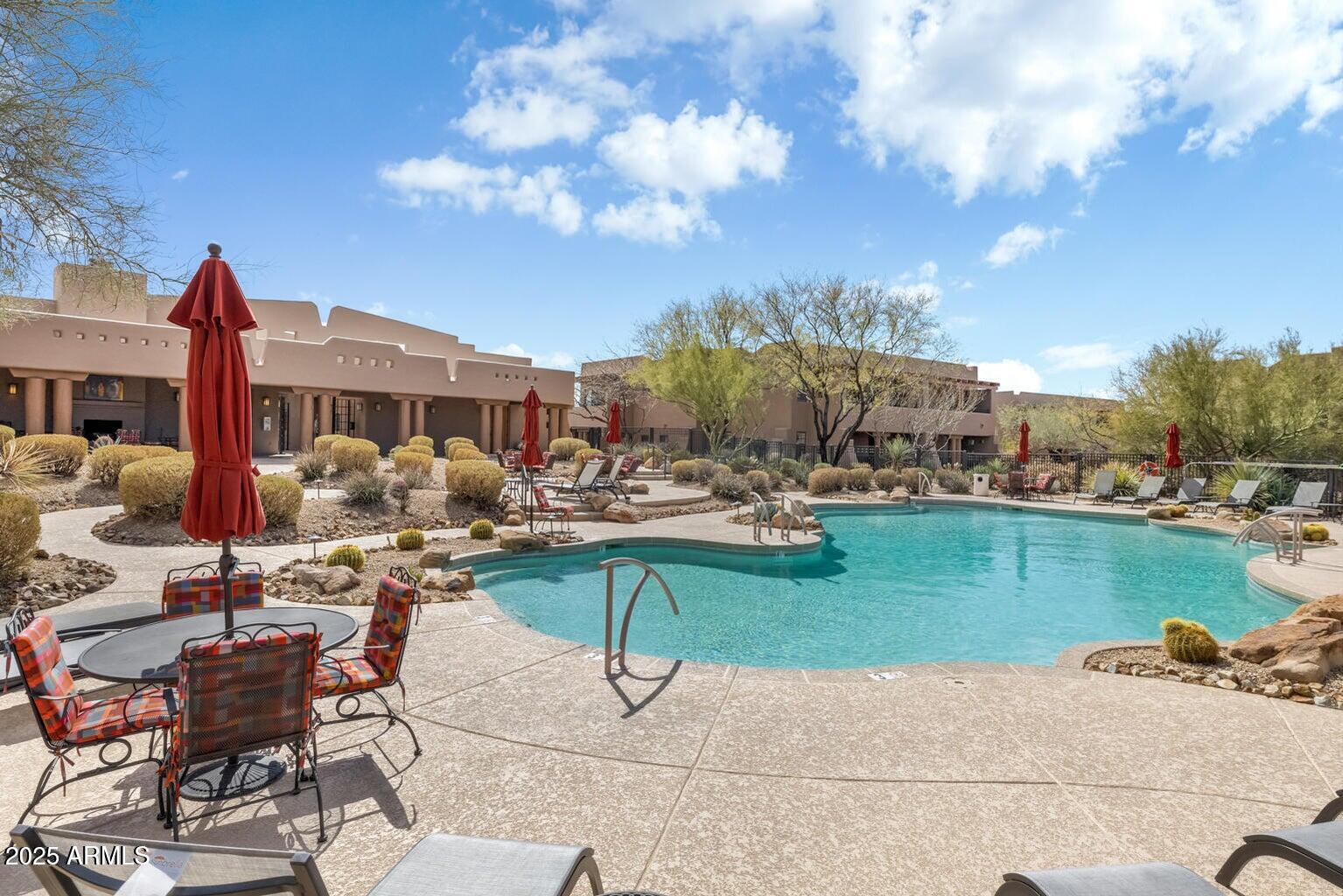36601 Mule Train Road, Unit D16 Carefree, AZ 85377 - Photo 25 of 29 a view of a lake with outdoor seating