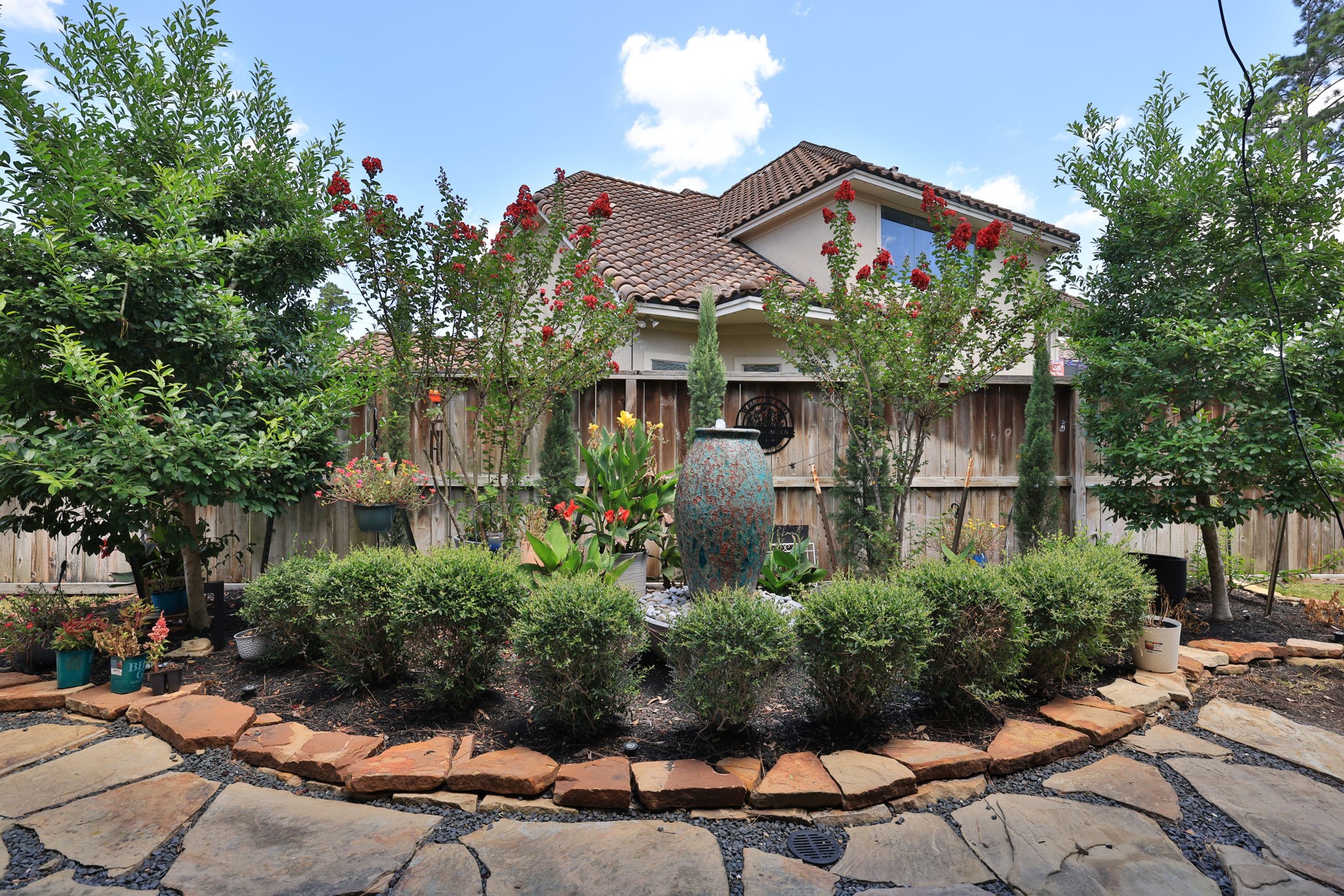 58 Shadow Creek Ridge Drive Spring, TX 77389 - Photo 47 of 49 Beautiful low maintenance backyard garden off the patio