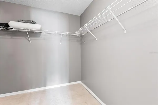 a view of a room with racks on the wall