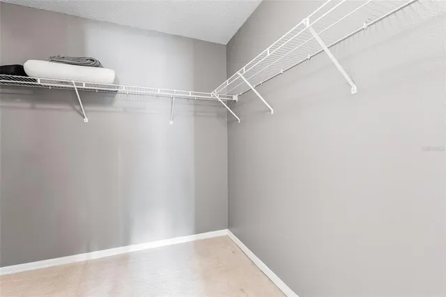 a view of a room with racks on the wall