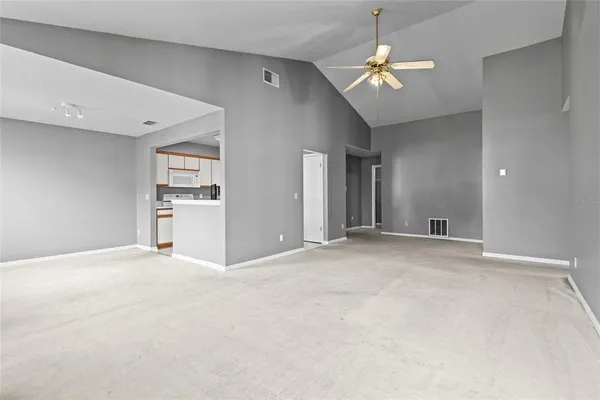 a view of a livingroom with a ceiling fan