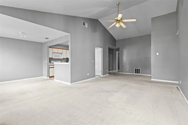 a view of a livingroom with a ceiling fan