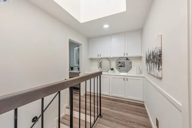 a bedroom with bed and a window