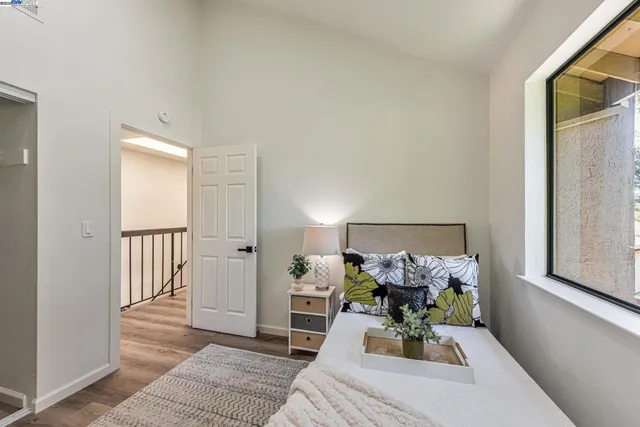 a bathroom with a sink a mirror and vanity