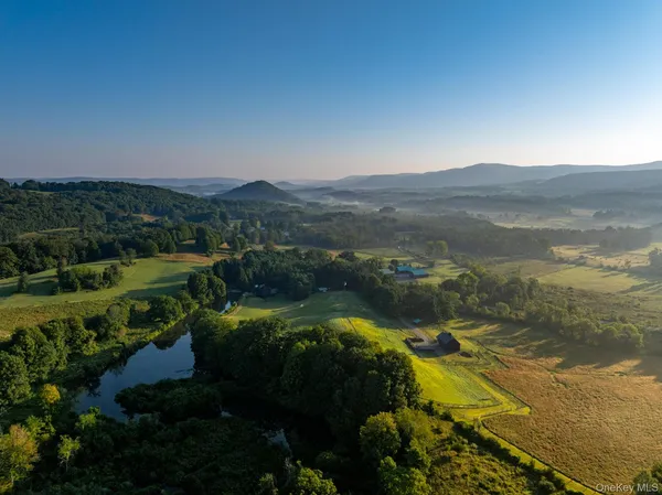 a view of lake with mountain