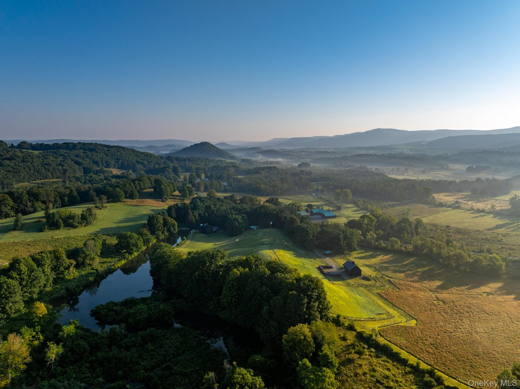 281 County Route 3 Ancramdale, NY 12503 - Photo 2 of 40 a view of lake with mountain