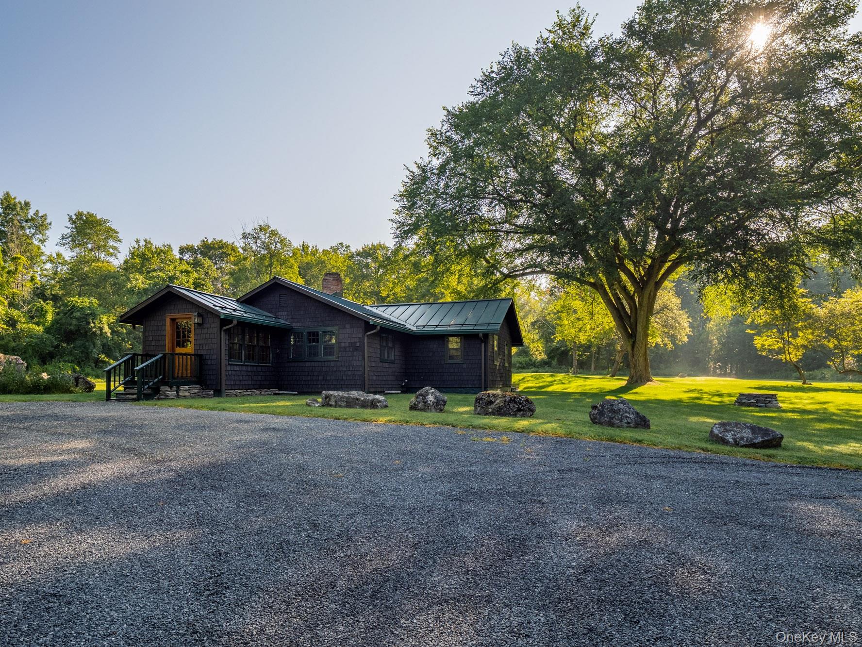 281 County Route 3 Ancramdale, NY 12503 - Photo 33 of 40 a view of a house with a yard and sitting area