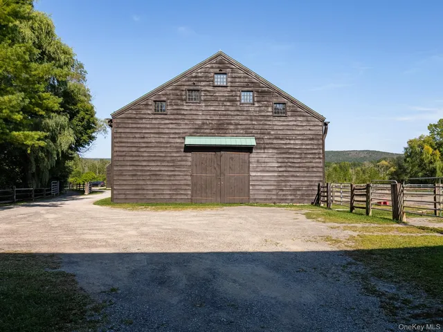 a view of a house with swimming pool