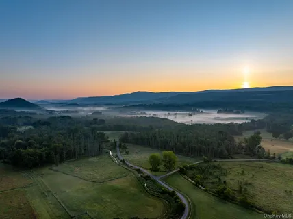 a view of a backyard with mountain view