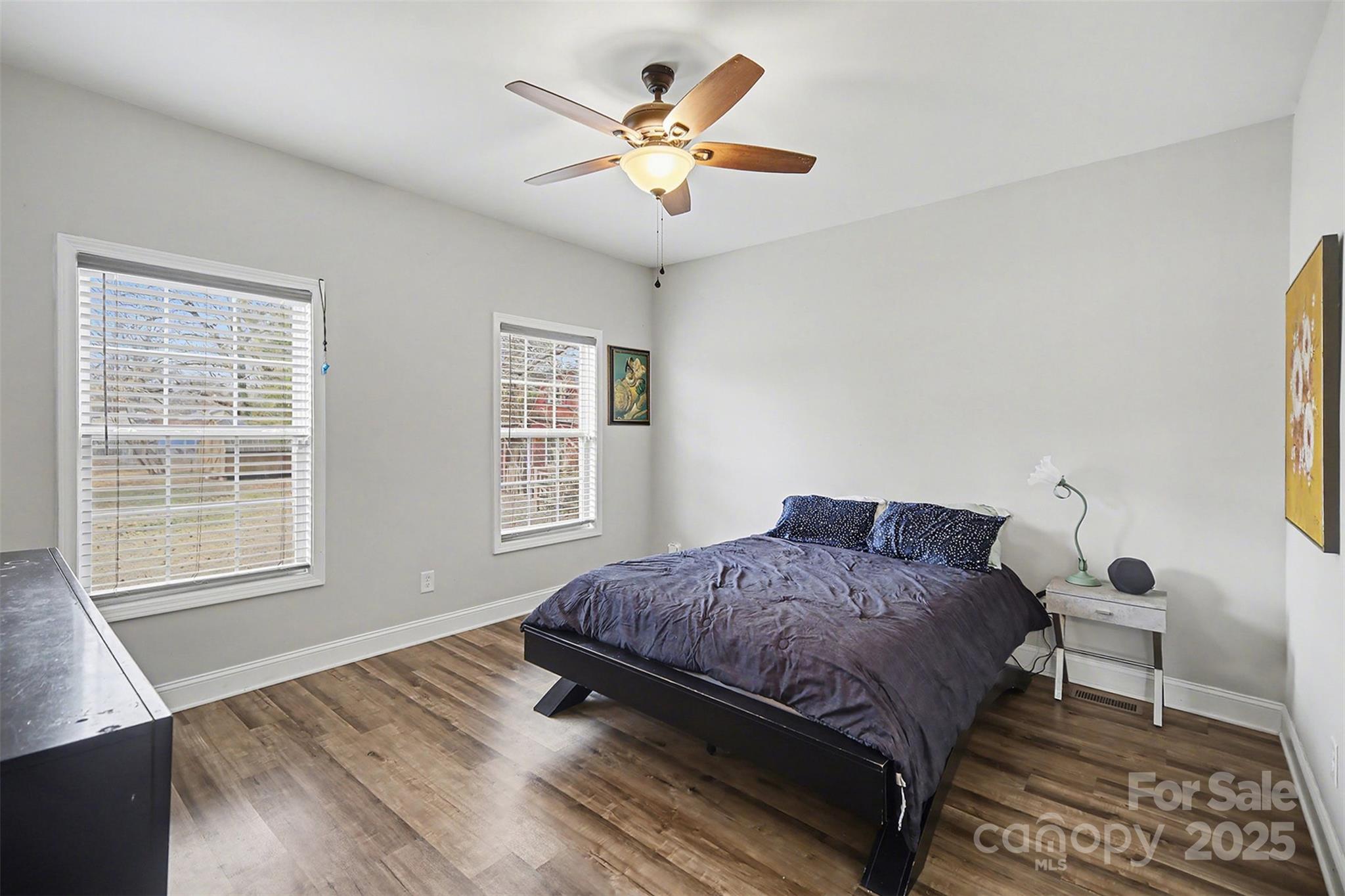802 Lowder Street Albemarle, NC 28001 - Photo 11 of 22 a bedroom with a bed and window