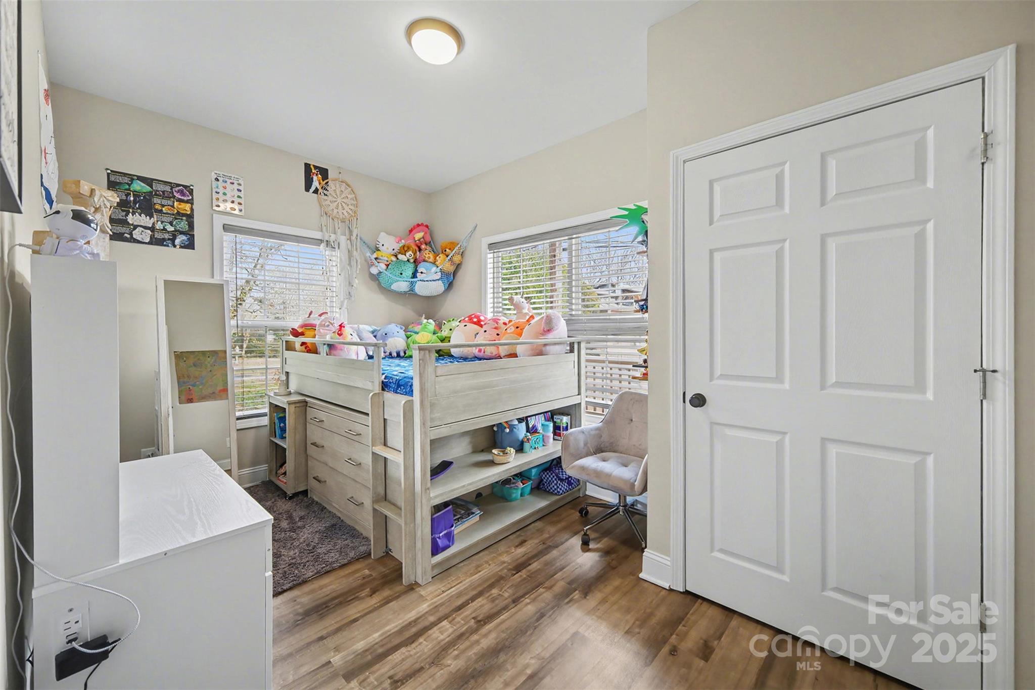 802 Lowder Street Albemarle, NC 28001 - Photo 15 of 22 a storage room with a bed and furniture