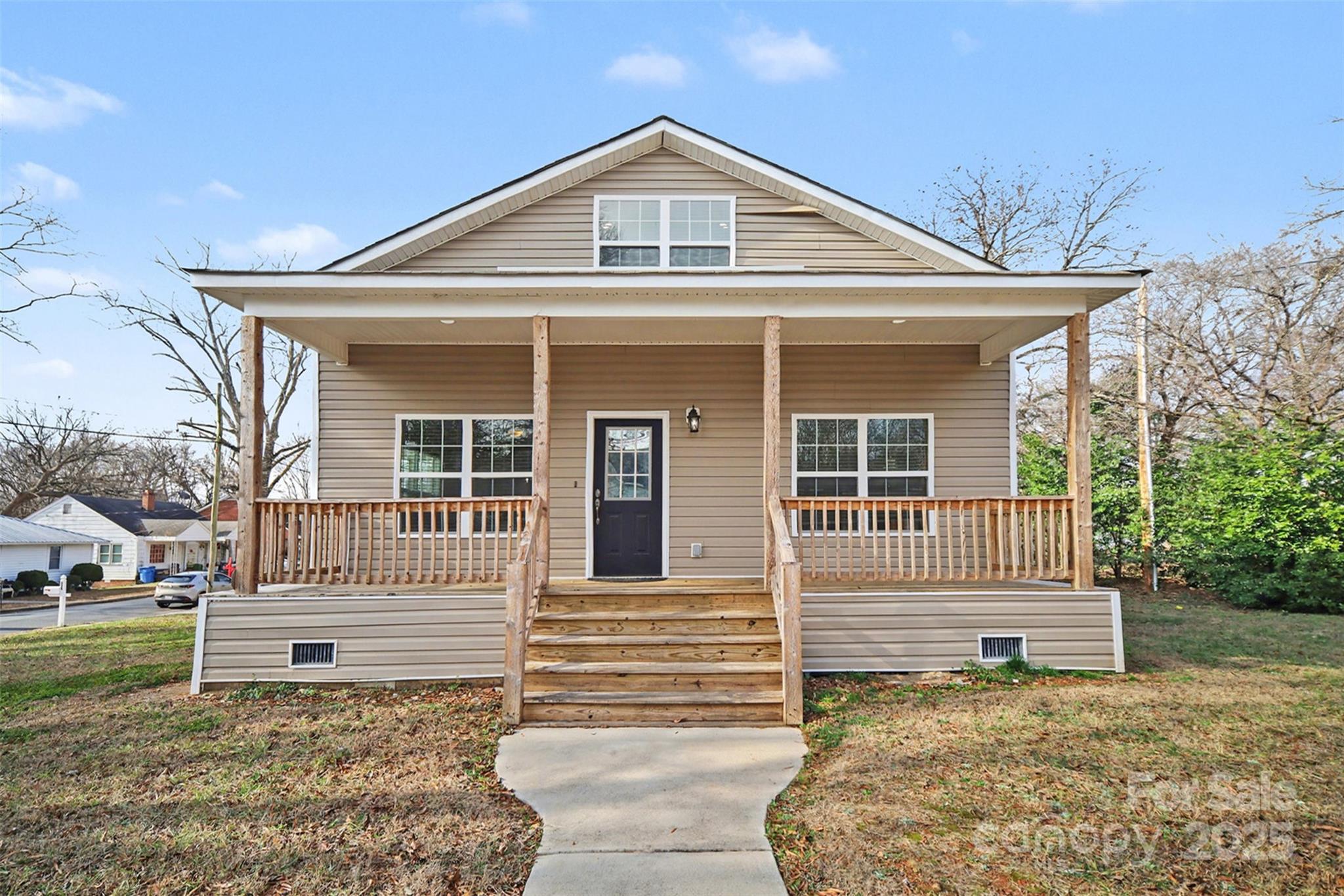 802 Lowder Street Albemarle, NC 28001 - Photo 2 of 22 a front view of a house with garden
