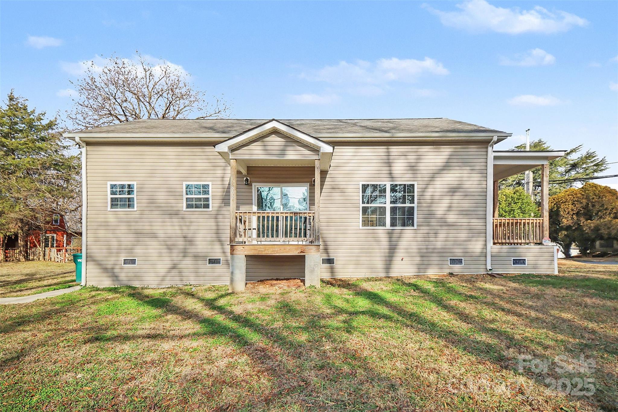 802 Lowder Street Albemarle, NC 28001 - Photo 21 of 22 front view of house with a yard
