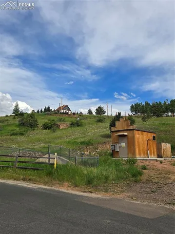 a view of a lake with a big yard